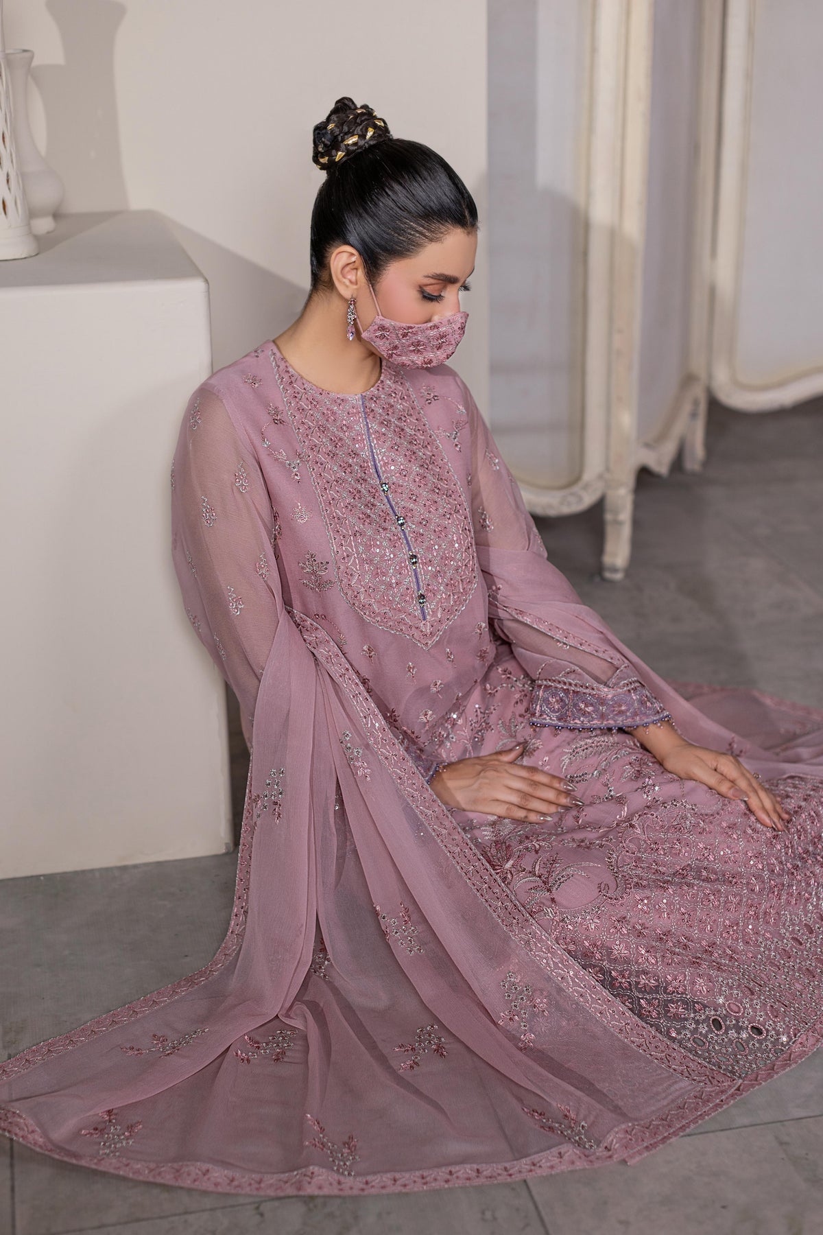 Roselle – Dusty Rose Embroidered Chiffon Suit with Sequin Detailing, Seated Pose | Flossie Formal Wear